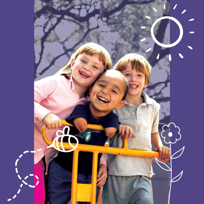 Three children on jungle gym